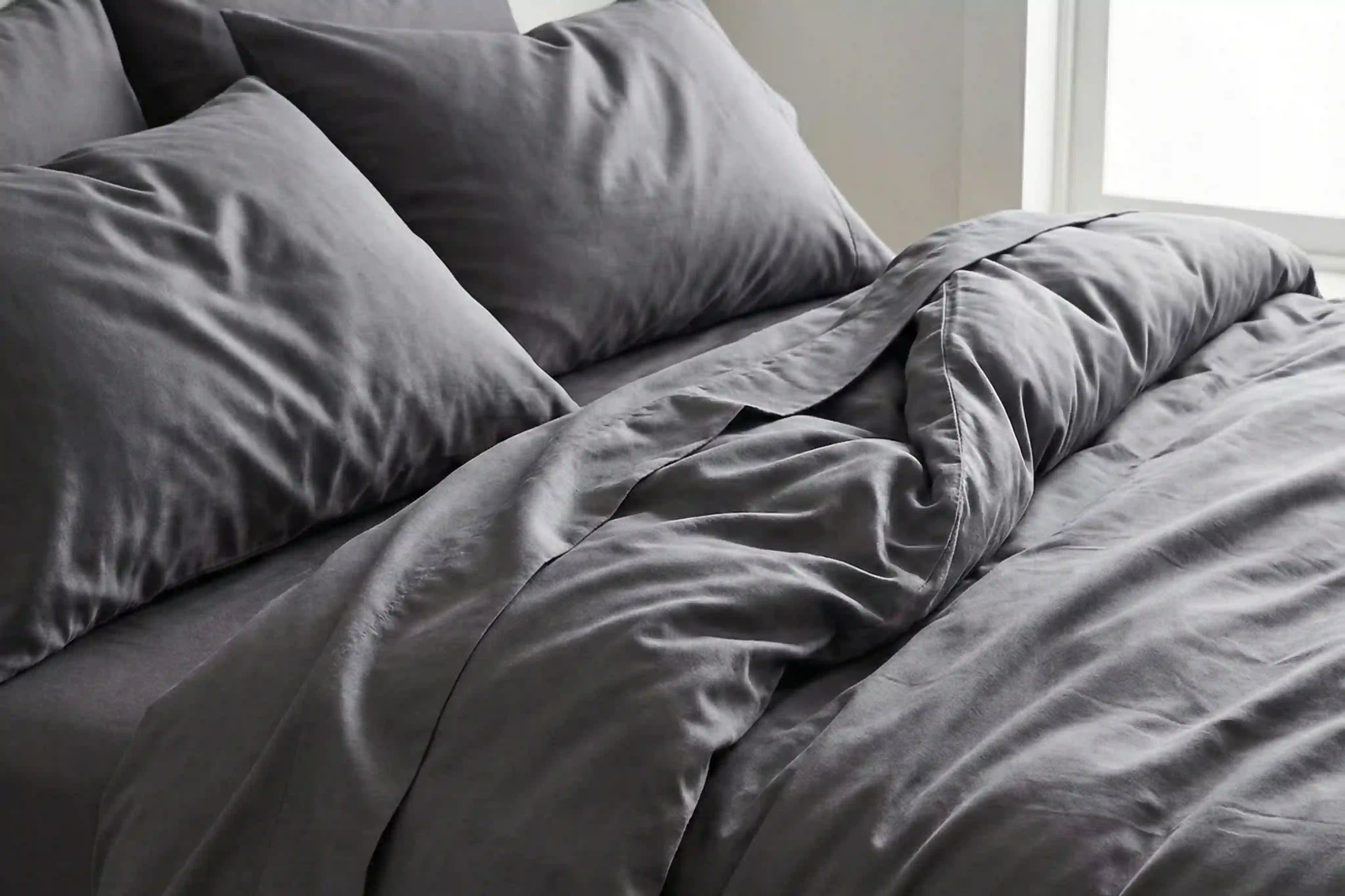 Luxury grey bed sheets and duvet cover set with pillows