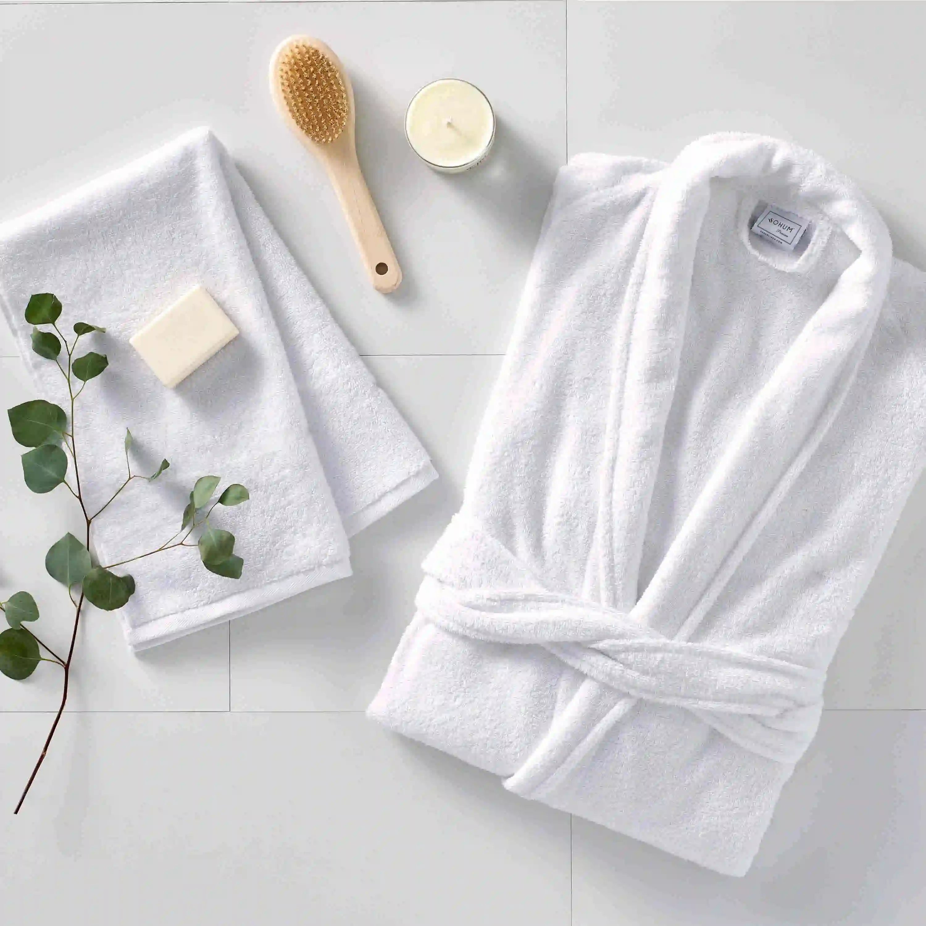 Luxury hotel bathrobe and towel set with spa accessories