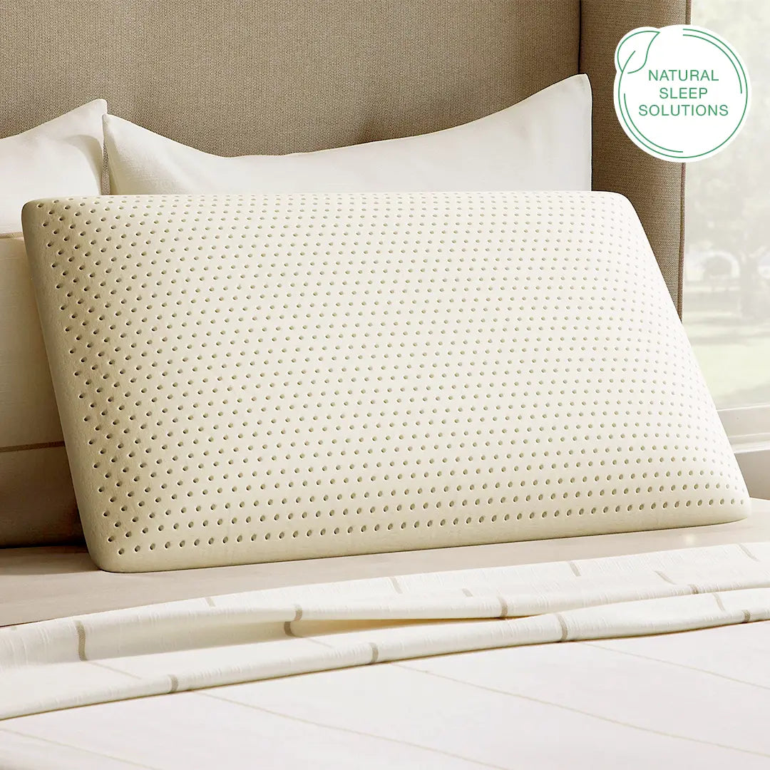 Natural latex pillow with breathable perforated design for cooling sleep support