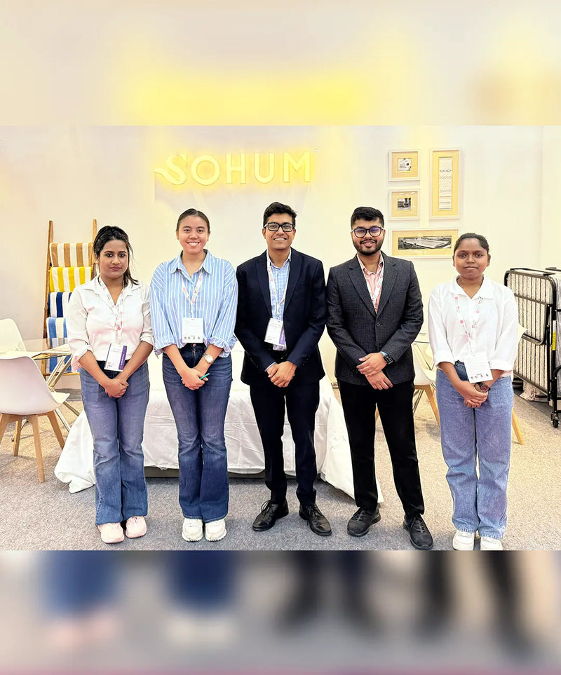 SOHUM team presenting luxury hotel linen and bedding products at a home textile exhibition