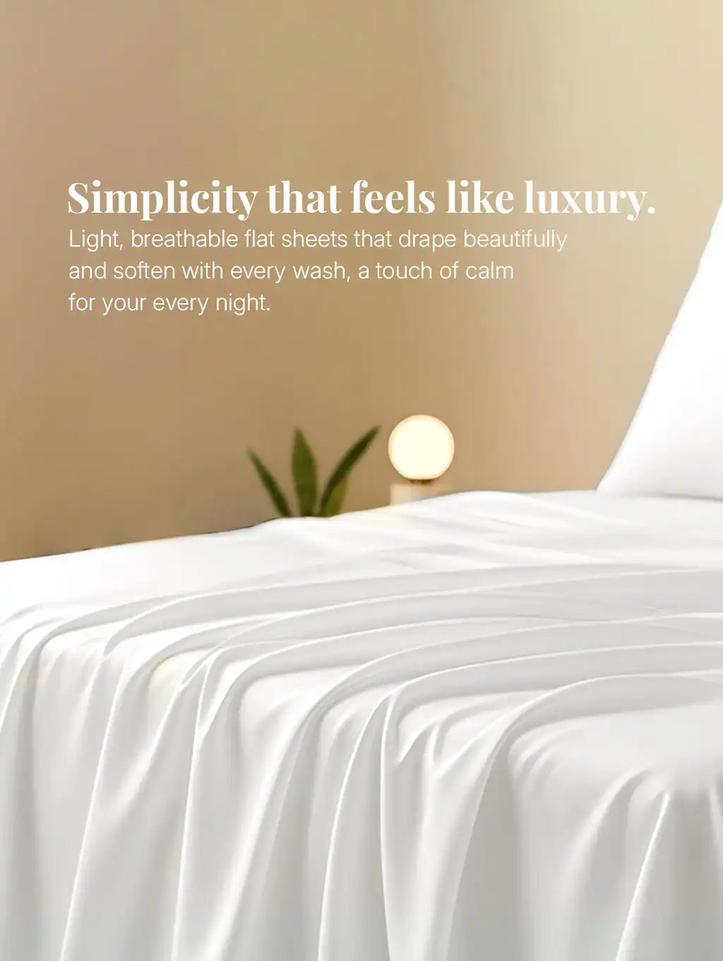 White flat sheet draped on bed in minimal bedroom setting