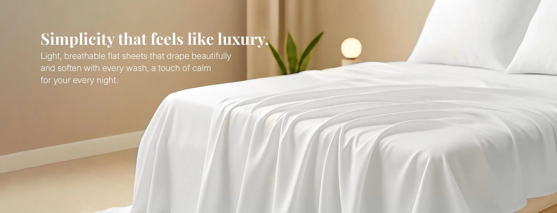 White flat sheet draped over bed in a minimal modern bedroom setting.